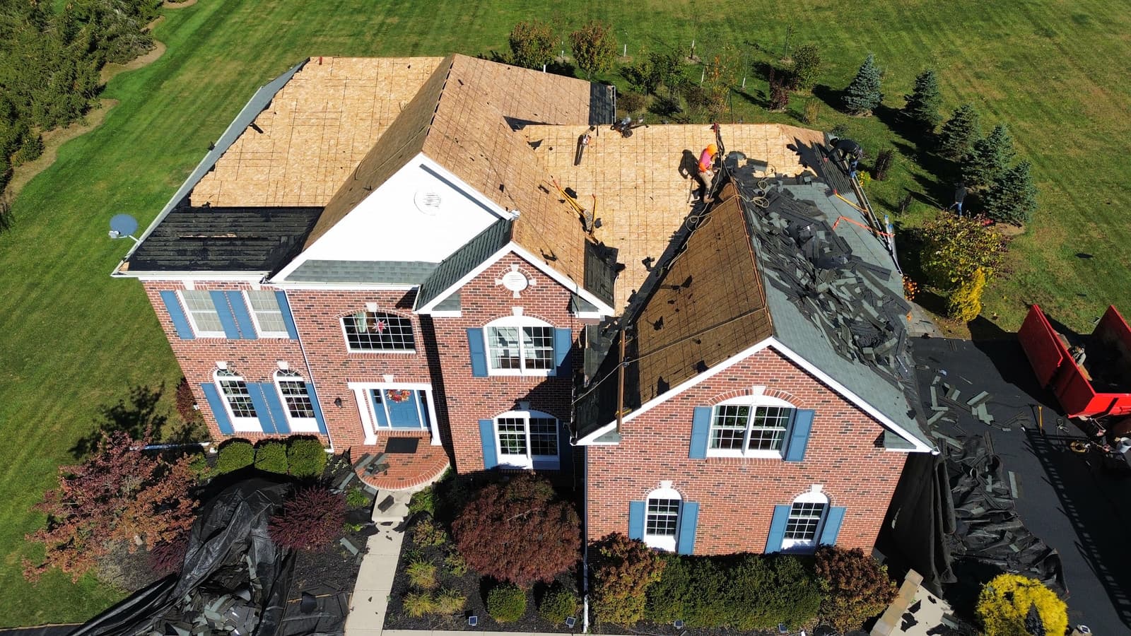Roof decking exposed during a full roof tear-off in Paramus, NJ