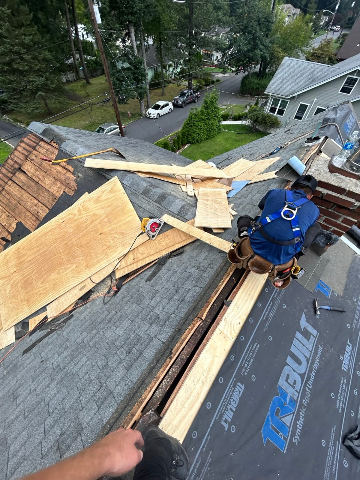Decking replacement and synthetic underlayment installation on a New Jersey roof.