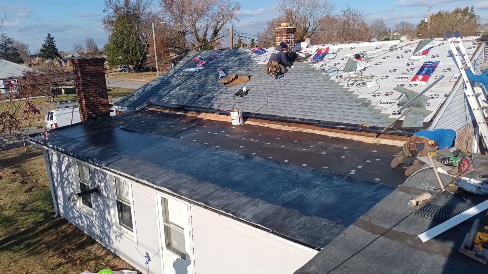 Commercial flat roof TPO membrane installation on a New Jersey building by Zubar Roofing.