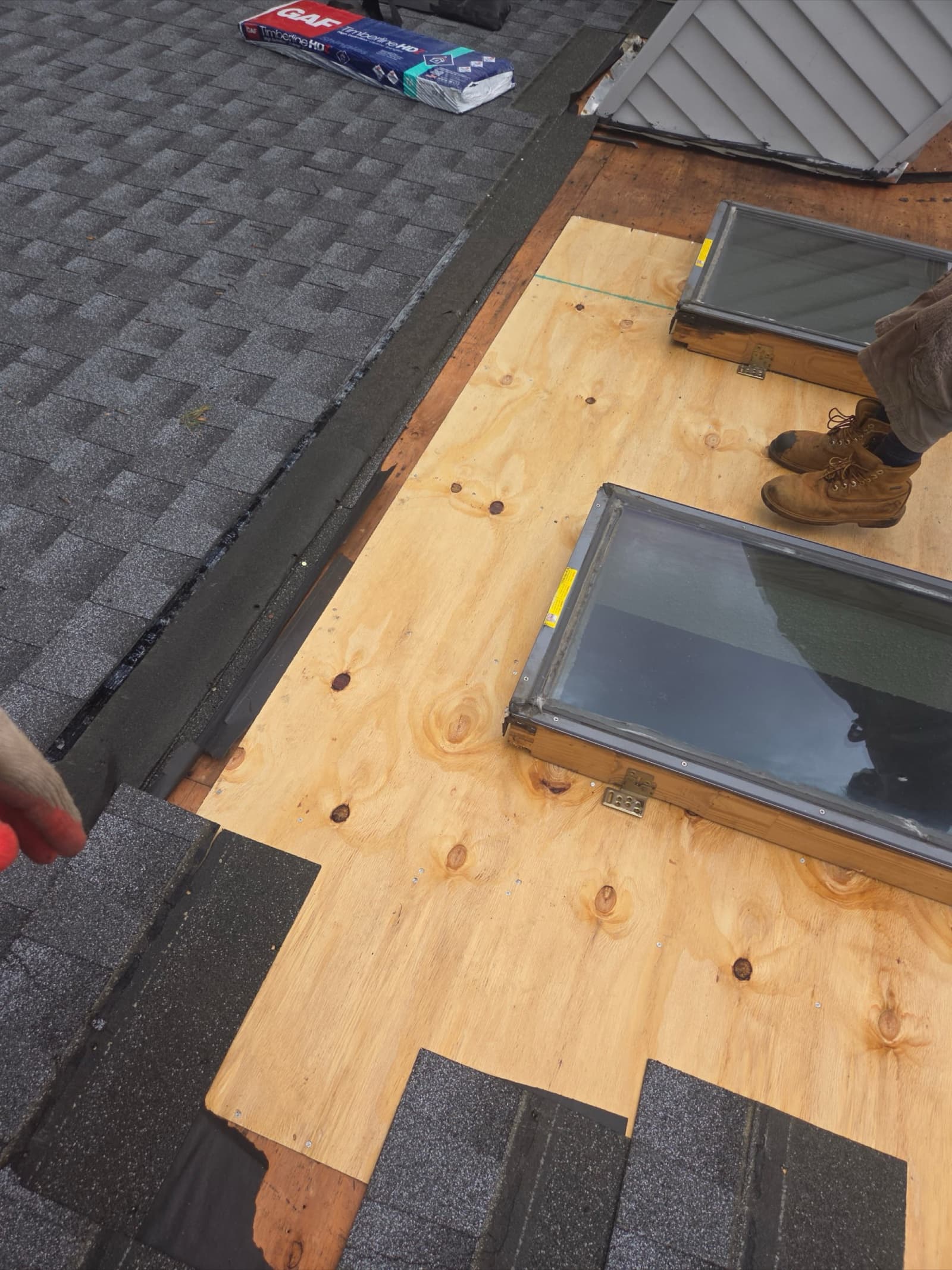 Skylight flashing kit installed over ice-and-water membrane on a GAF shingle roof in New Jersey by Zubar Roofing.